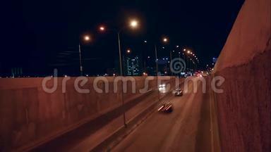 汽车夜间活动交通城市红绿灯在街道上的时间流逝。 都市生活生活生活方式
